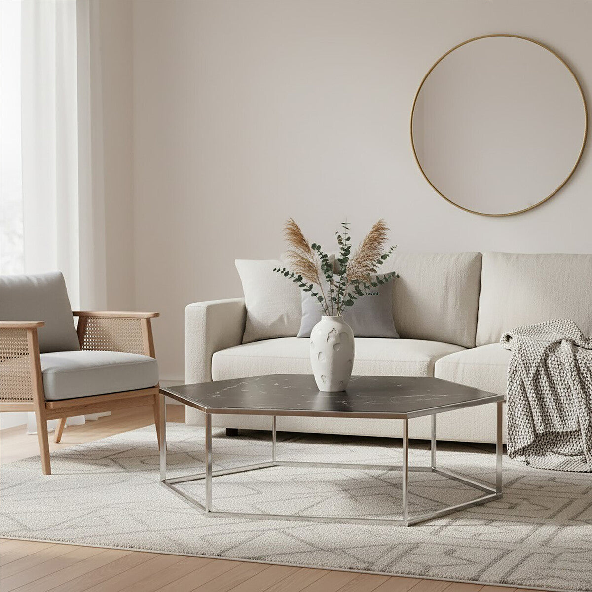 Modern living room with a beige sofa, wooden armchair, and hexagonal coffee table.