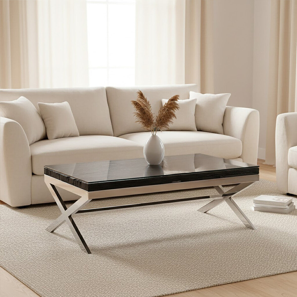 Beige sofa with a coffee table and decorative vase in a living room setting