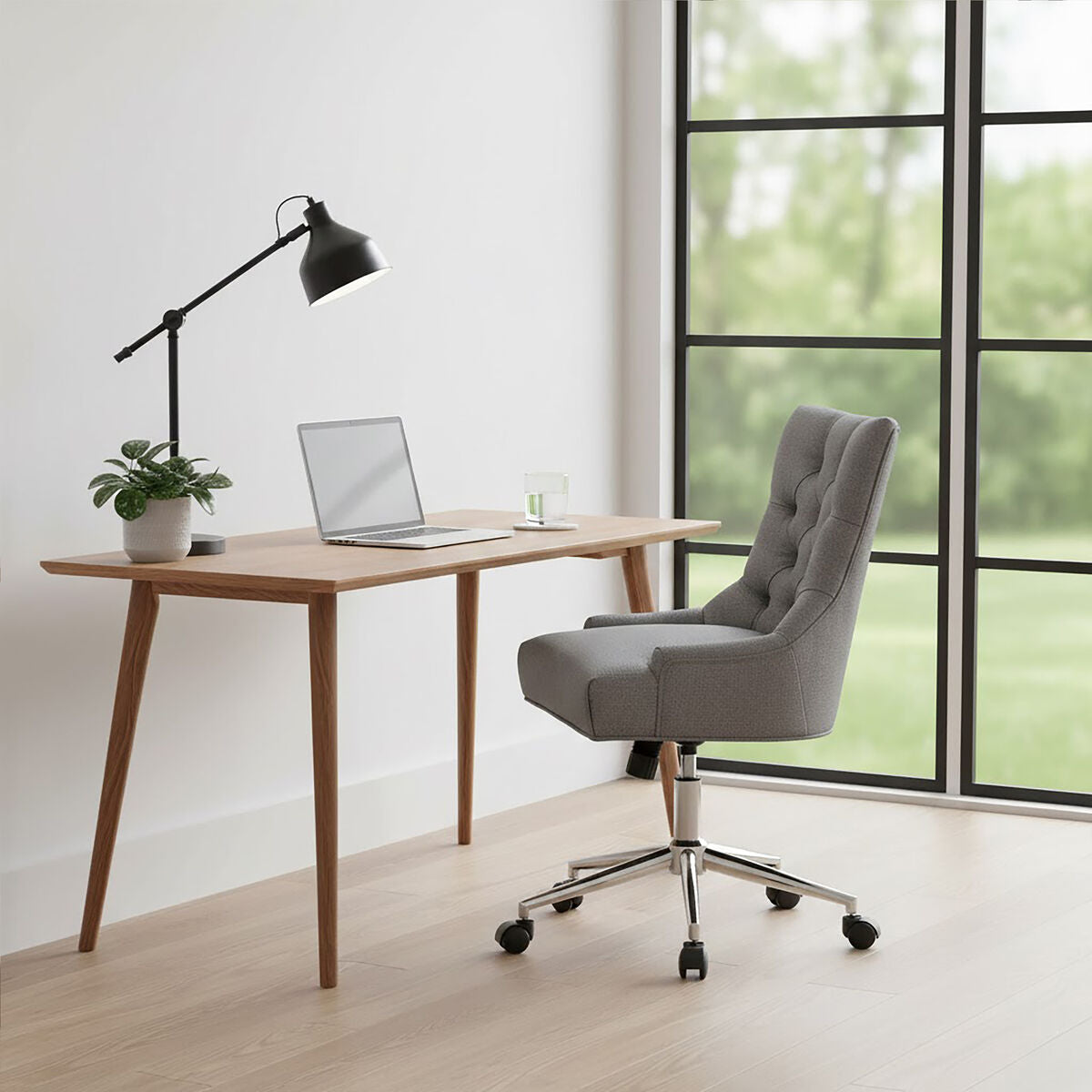 Modern home office with wooden desk, gray chair, and large window.