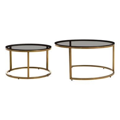 Two round glass coffee tables with gold metal frames on a white background