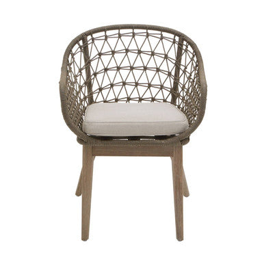 Woven chair with a white cushion on a white background