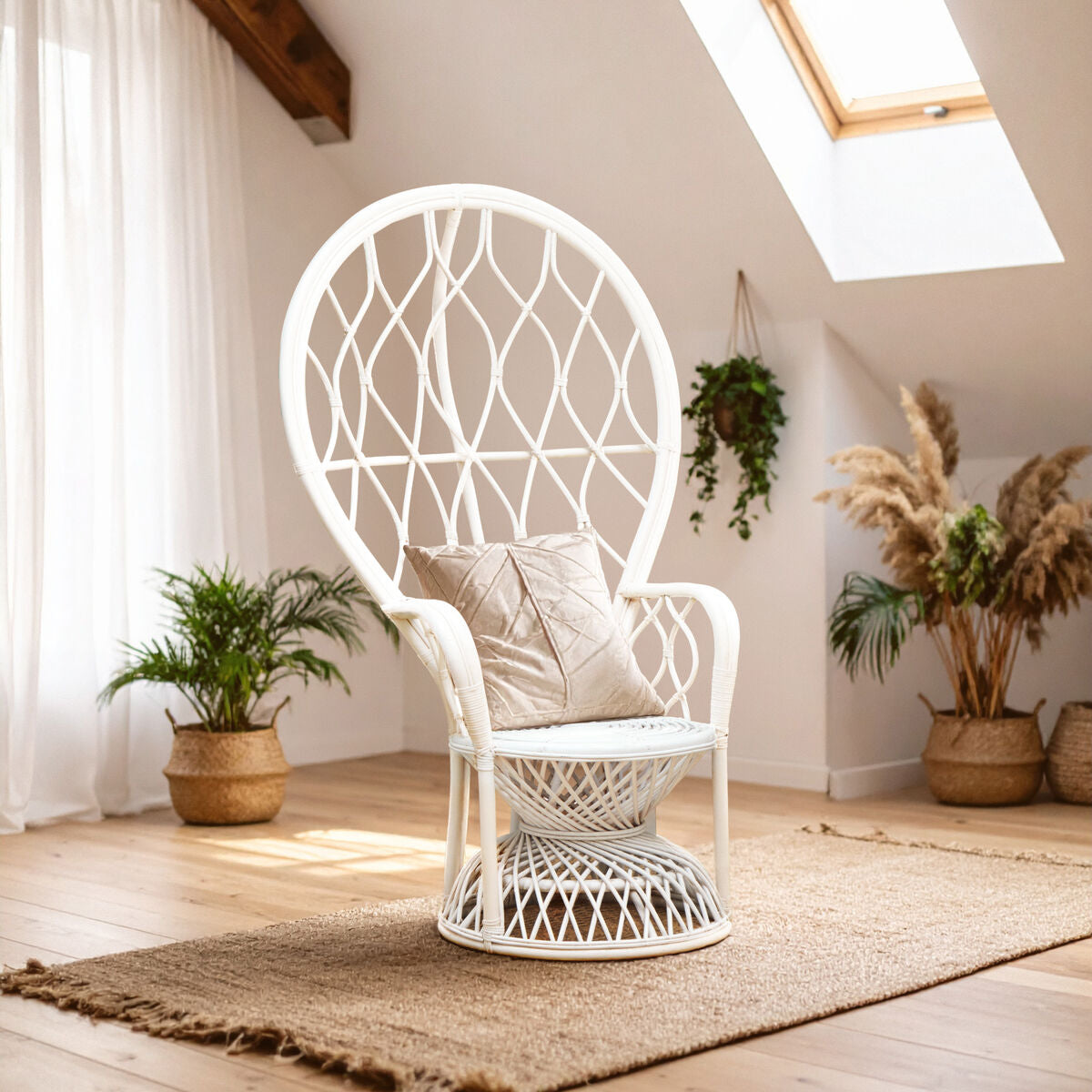 White peacock chair in a bright room with plants and natural light