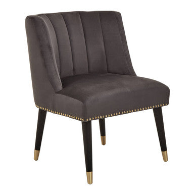 Gray upholstered chair with gold nailhead trim on a white background