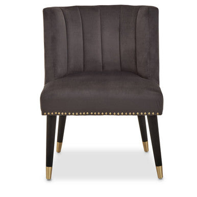 Gray upholstered chair with gold accents on a white background