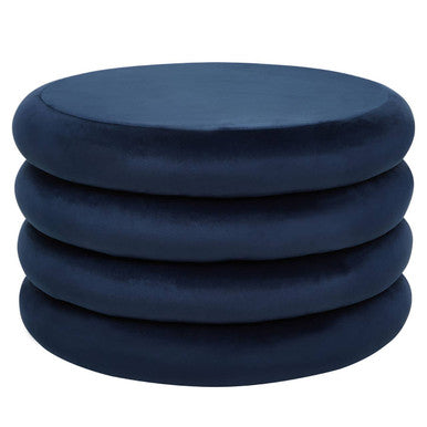 Stack of four navy blue cushions on a white background