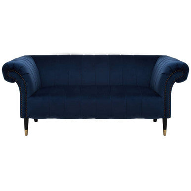 Navy blue sofa with gold legs on a white background