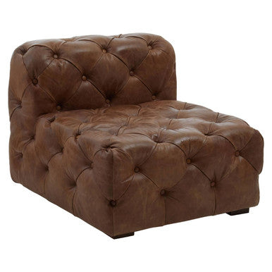 Brown leather armchair with tufted design on a white background
