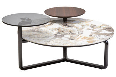 Multi-level coffee table with different surface finishes on a white background