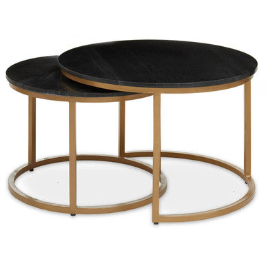 Set of two round coffee tables with black marble tops and gold metal frames on a white background