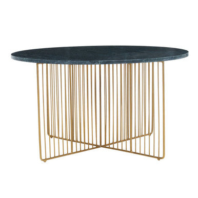 Dining table with dark marble top and gold metal base on a white background