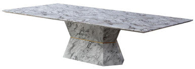 Marble dining table with a unique base design on a white background