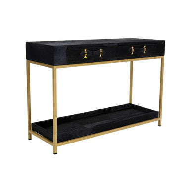 Console table with black top and gold legs on a white background