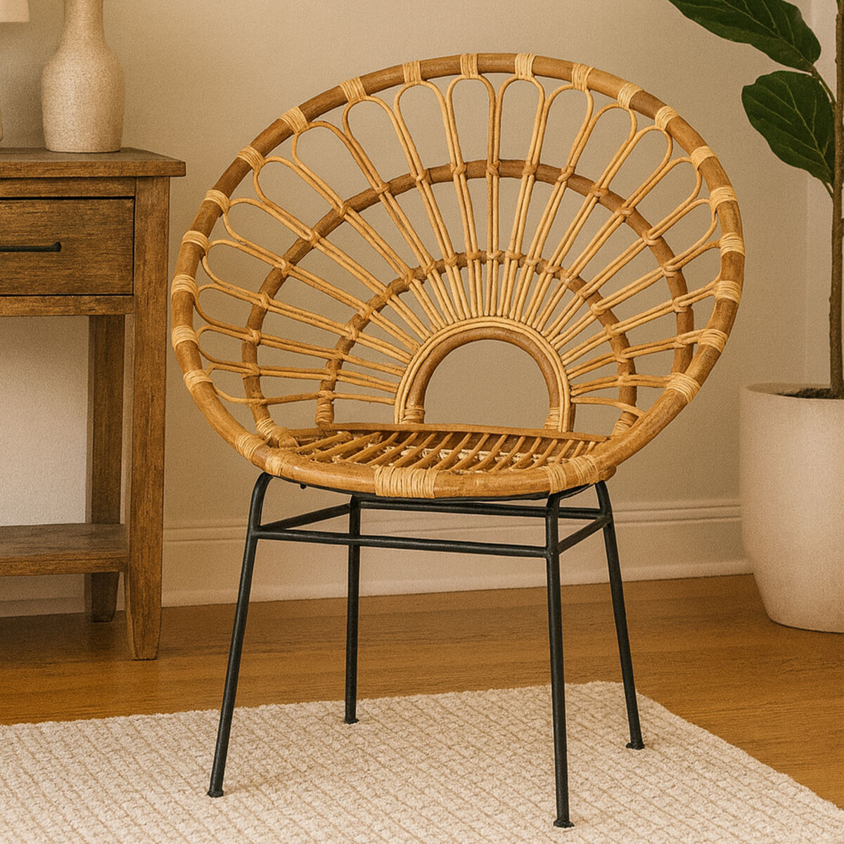 Wicker chair with black metal legs in a room setting