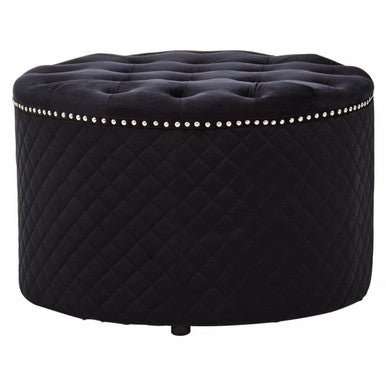 Black tufted ottoman with decorative studs on a white background