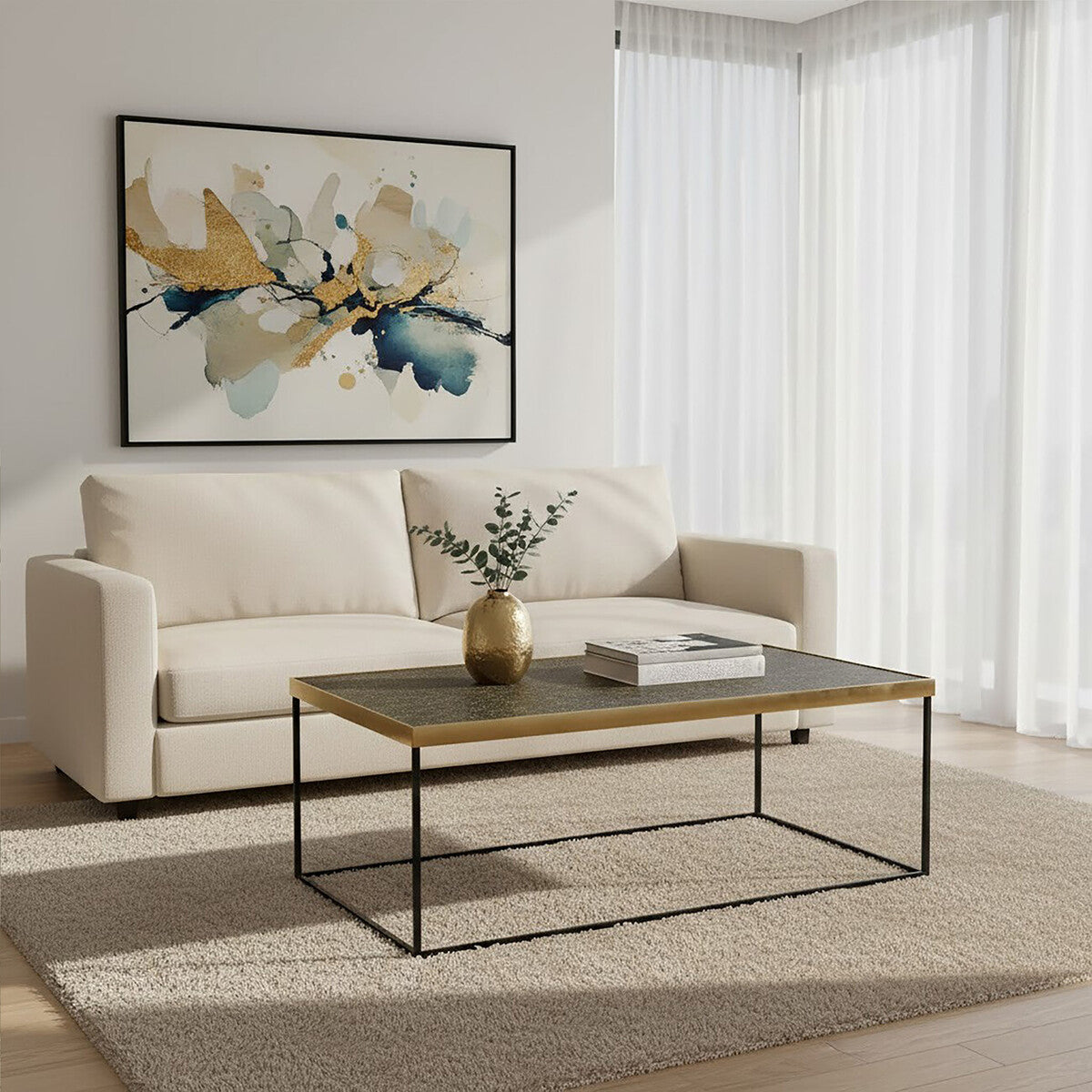 Modern living room with a beige sofa, coffee table, and abstract art on the wall.