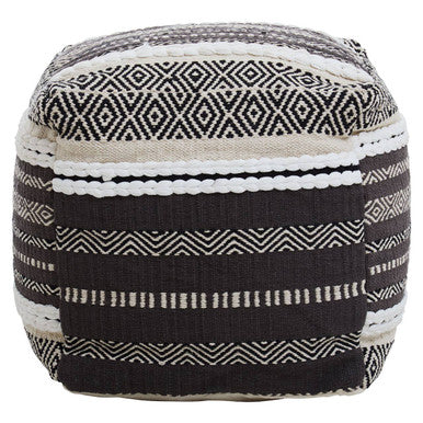 Black and white patterned cube-shaped ottoman on a white background