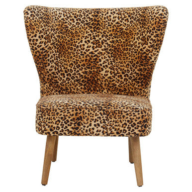 Chair with leopard print upholstery on a white background