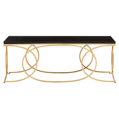 Console table with gold metal frame and black marble top on a white background