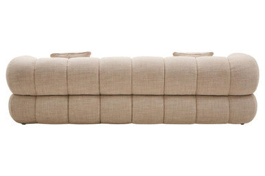 Beige upholstered bench on a white background