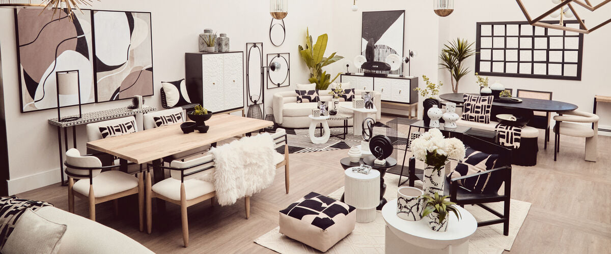 Modern living room with furniture and decor items.