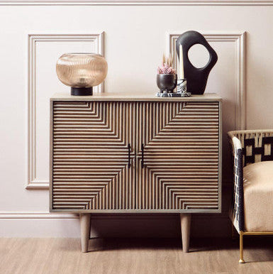 Decorative cabinet with geometric pattern in a room setting