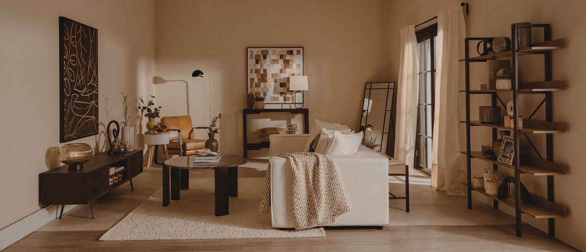 Living room with beige walls, furniture, and decor items.