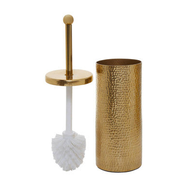 Gold toilet brush holder with white brush on a white background