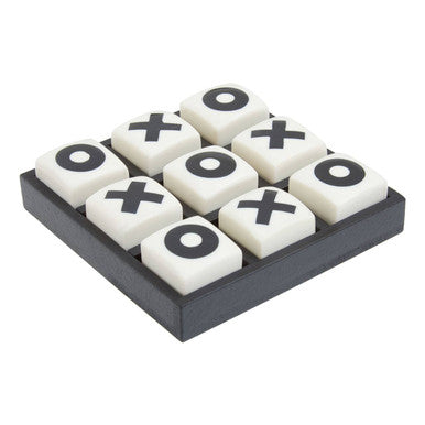 Noughts and crosses game set with white cubes and black symbols on a white background