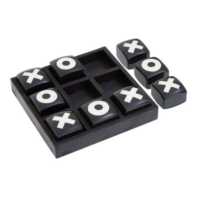 Tic-tac-toe game set with black board and white markers on a white background
