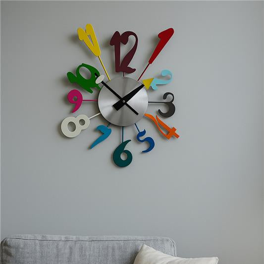 Colorful wall clock on a gray wall