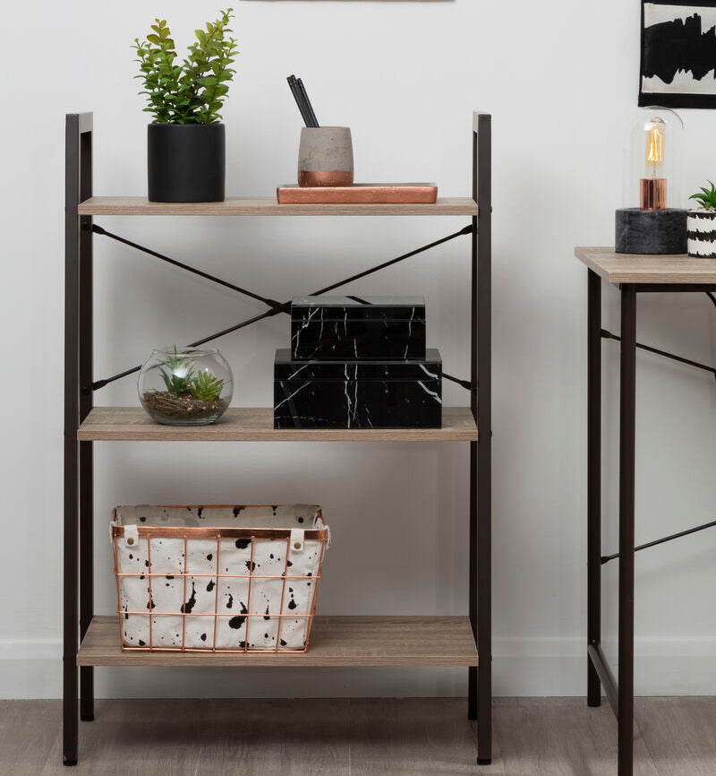 Bookshelf with decorative items against a white wall