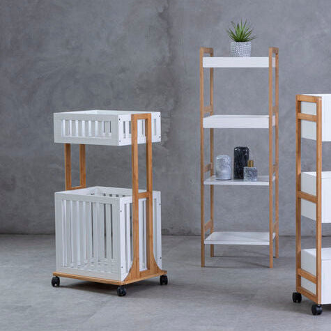 Set of white shelves with wooden frames in a gray room.