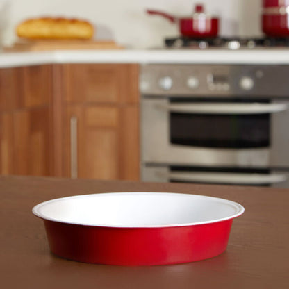 Red bowl on a kitchen counter with blurred background