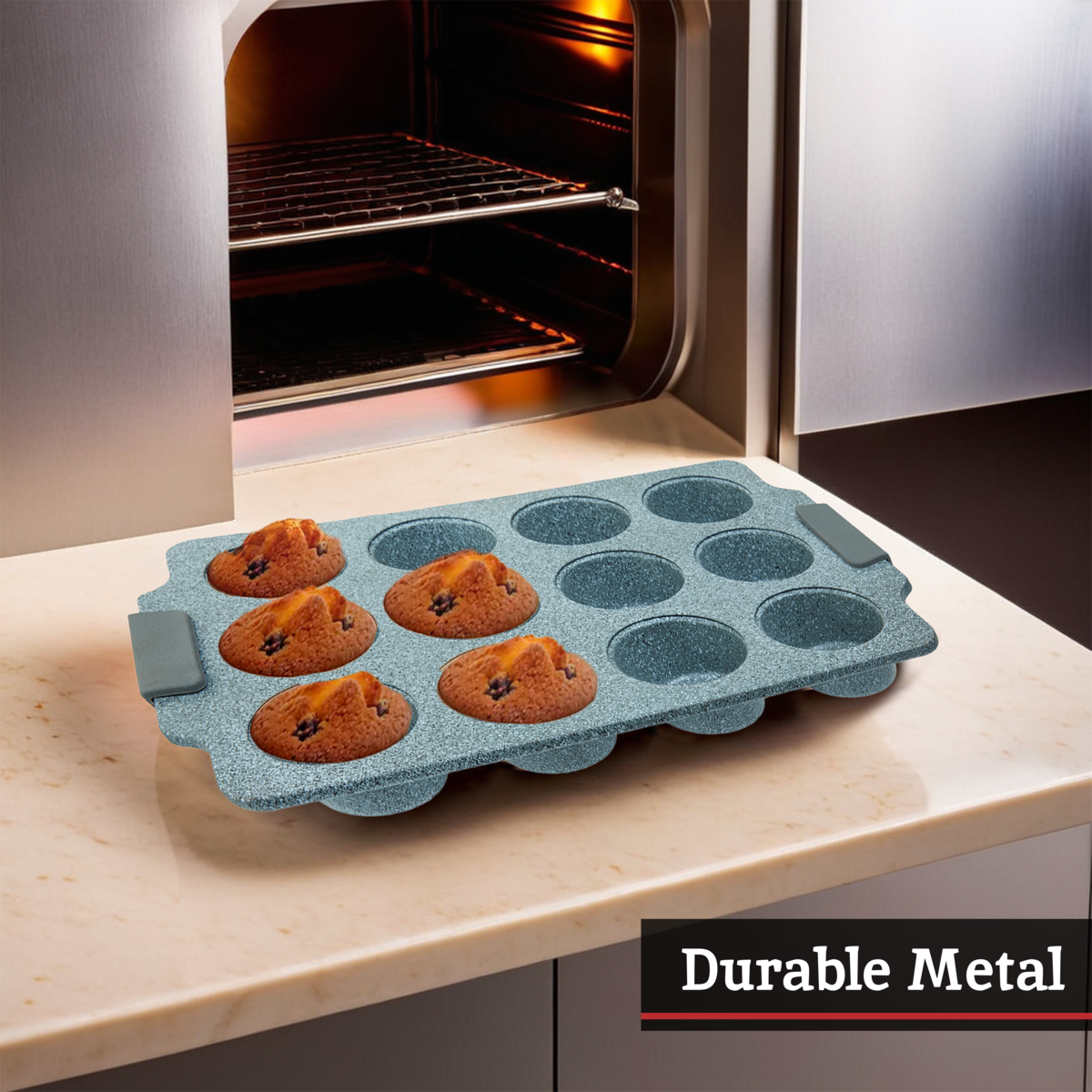 Blue muffin tray with baked muffins on a kitchen counter next to an open oven.