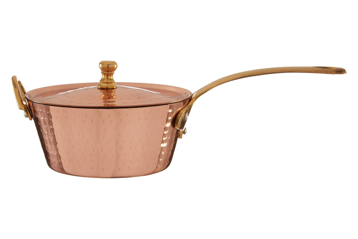 Copper saucepan with lid on a white background