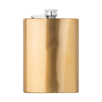 Gold flask with silver cap on a white background