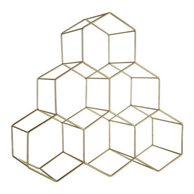 Geometric gold wall art piece on a white background