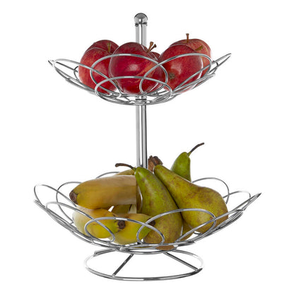 Two-tier metal fruit basket with apples and pears on a white background