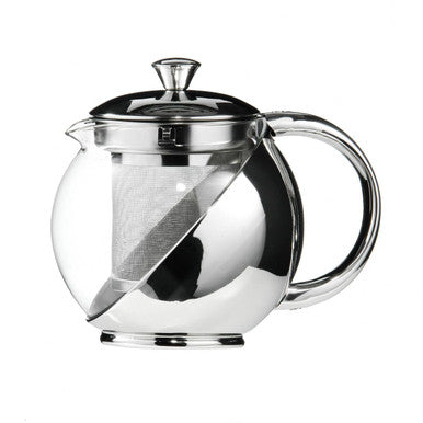 Glass teapot with metal lid and handle on a white background