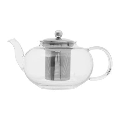 Clear glass teapot with metal lid and handle on a white background