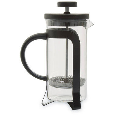 Clear glass French press with black handle and lid on a white background