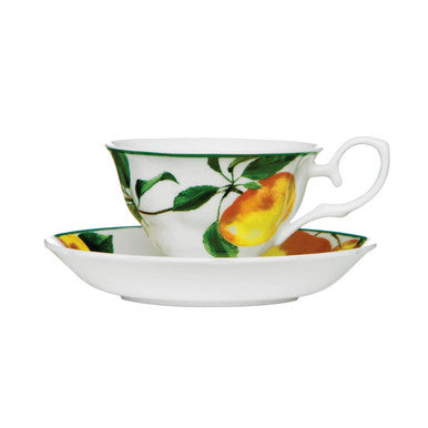Teacup and saucer with lemon design on a white background