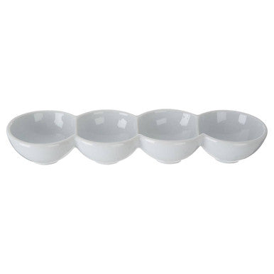 Set of four white ceramic bowls on a white background