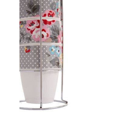 Decorative lamp with floral and polka dot pattern on a white background