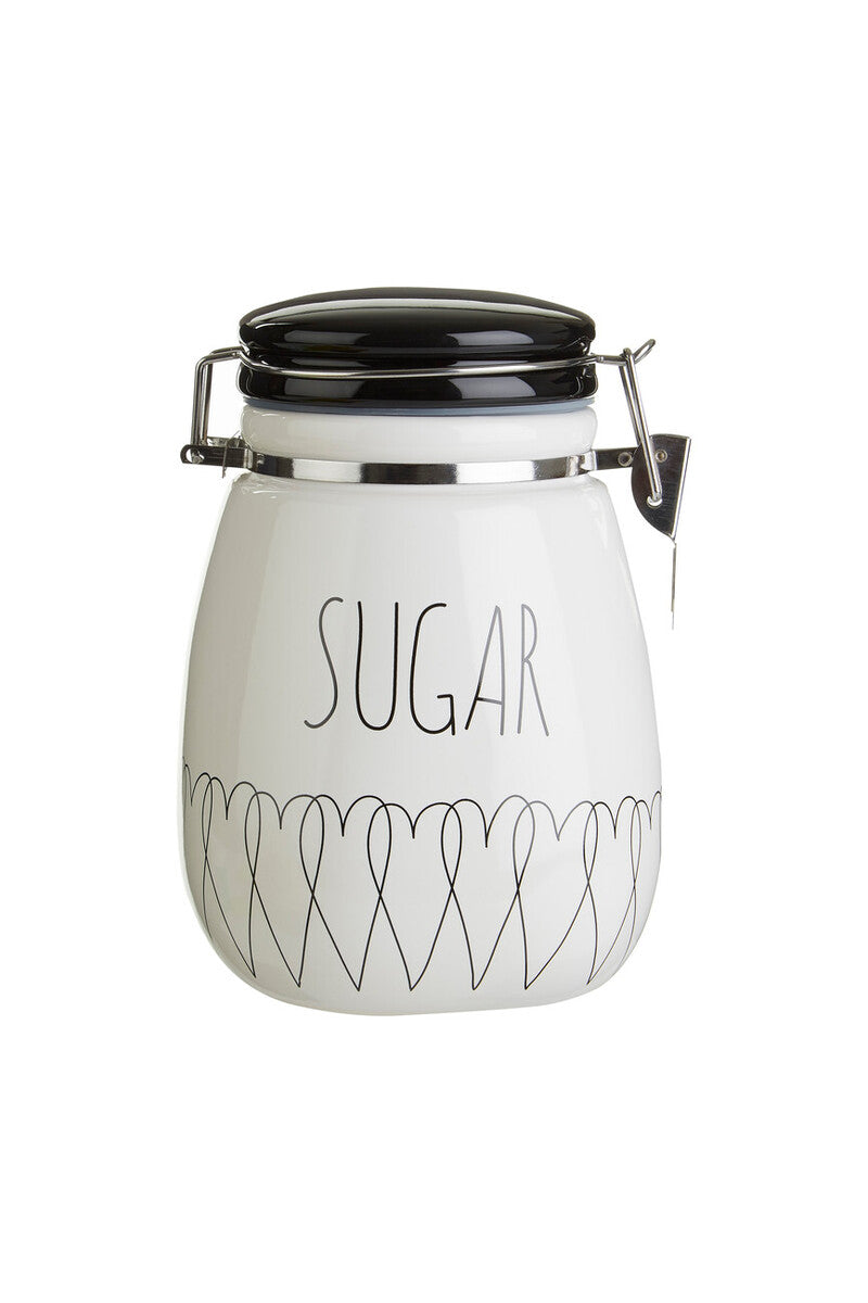 White sugar jar with black text and lid on a white background