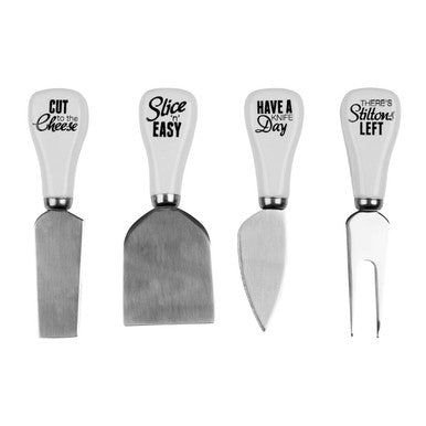Set of four cheese knives with humorous handles on a white background