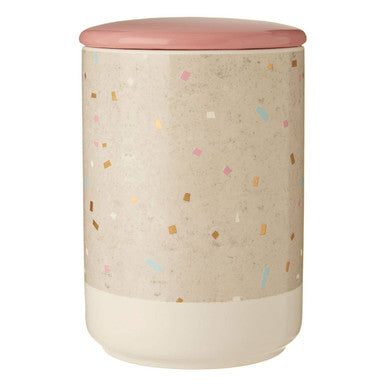 Stool with a patterned design and pink top on a white background