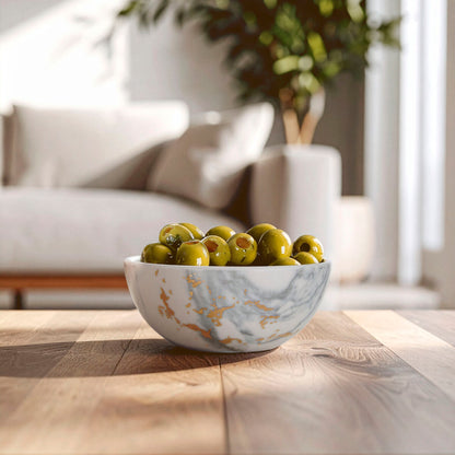Bowl of green apples on a wooden table with a blurred living room background