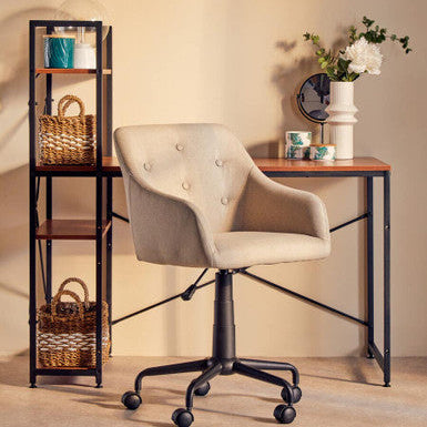 Beige office chair in a room with a small table and shelves.