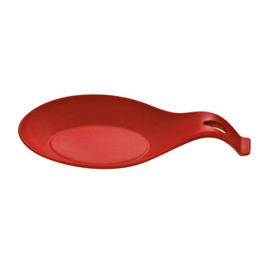 Red ceramic spoon rest on a white background
